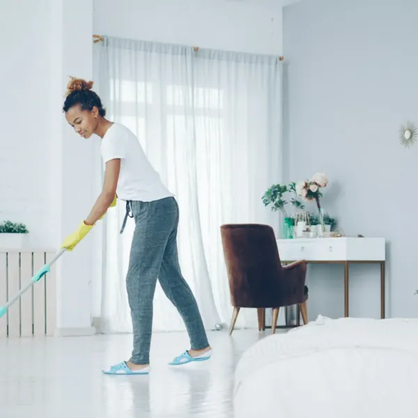 Mopping a bright living room floor