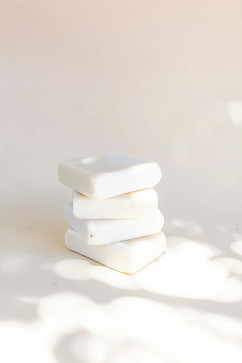 Stack of plain white soap bars