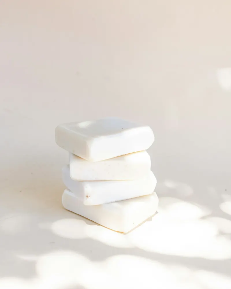 Stack of plain white soap bars